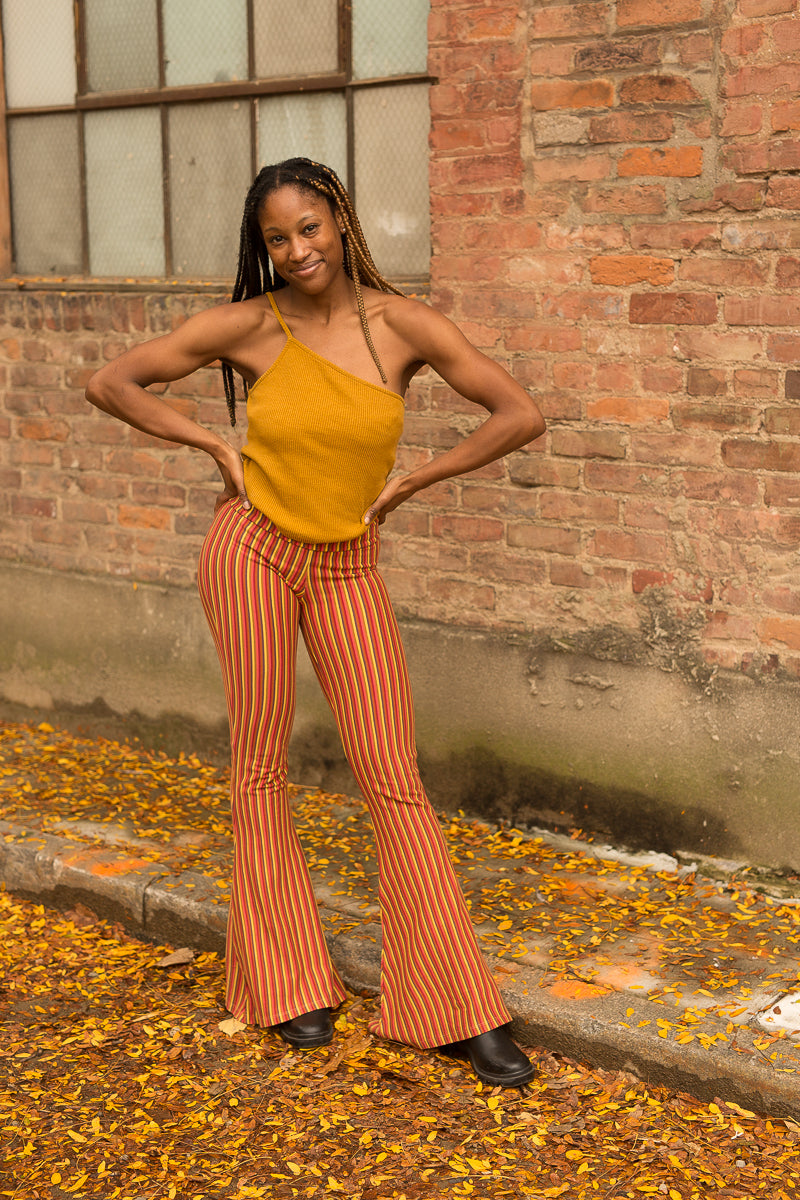 70's Fall Outfits  Dresses with leggings, Stripe pants outfit, Velvet  flare pants